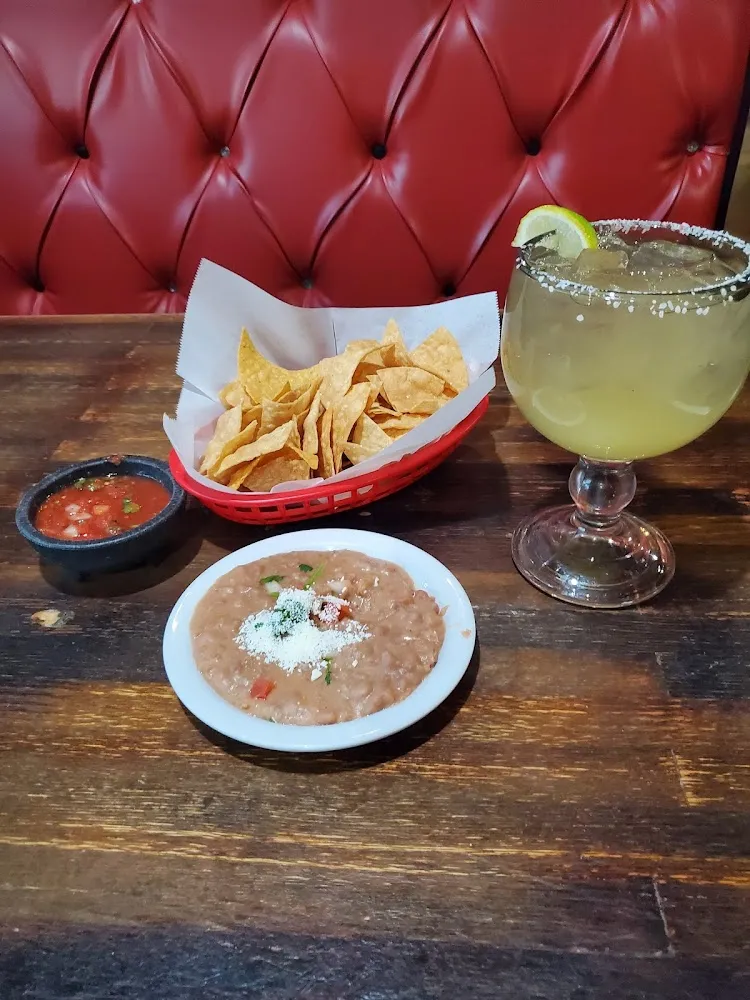 Complimentary Chips and Salsa with Refried Beans